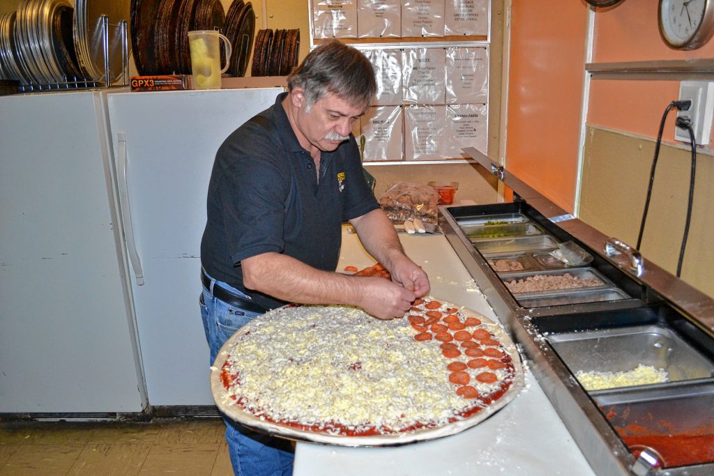 If you get pepperoni on your super dominator from Donatello's, expect to see anywhere from 92 to 120 of the popular topping. This one got 112 pepperonis. TIM GOODWIN / Insider staff