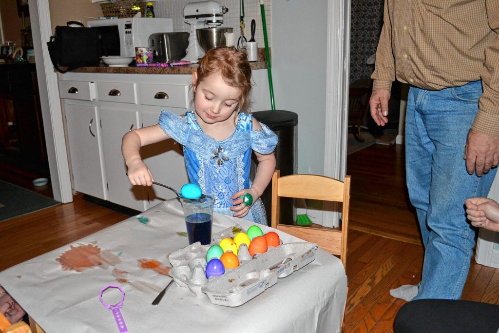Sophie, Tim's daughter, had a grand old time dyeing eggs thanks to a trusty kit her parents bought for her in anticipation of Easter. TIM GOODWIN / Insider staff