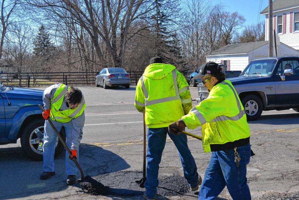 Tim filled some potholes with the Concord General Services crew last week at one of the busier spots in town – the intersection of Pleasant, Warren and North and South Fruit streets. Because it is spring in New Hampshire, and those potholes aren't going to fix themselves. KEVIN DEMERS / For the Insider