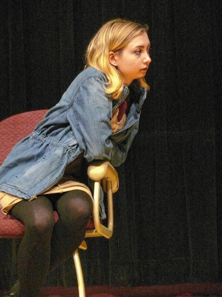 NHTI drama student Ashlee Bliss rehearses a scene from “The Hot L Baltimore,” which the school's Stage Lynx troupe will perform this weekend at NHTI's Sweeney Auditorium. Courtesy of NHTI