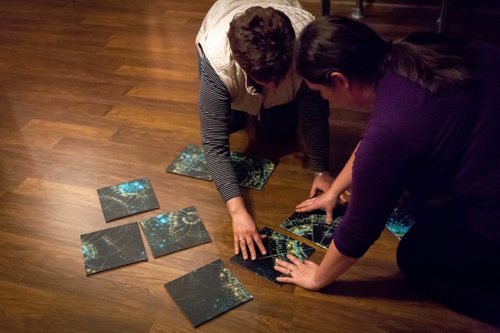 Sarah Pearson (right) and her mother Lucie Kinney arrange pieces of a puzzle during a Concord Insider/Monitor team tackle of The Enigma at the Escape Room in Concord on Wednesday, April 25, 2018. (ELIZABETH FRANTZ / Monitor staff) Elizabeth Frantz