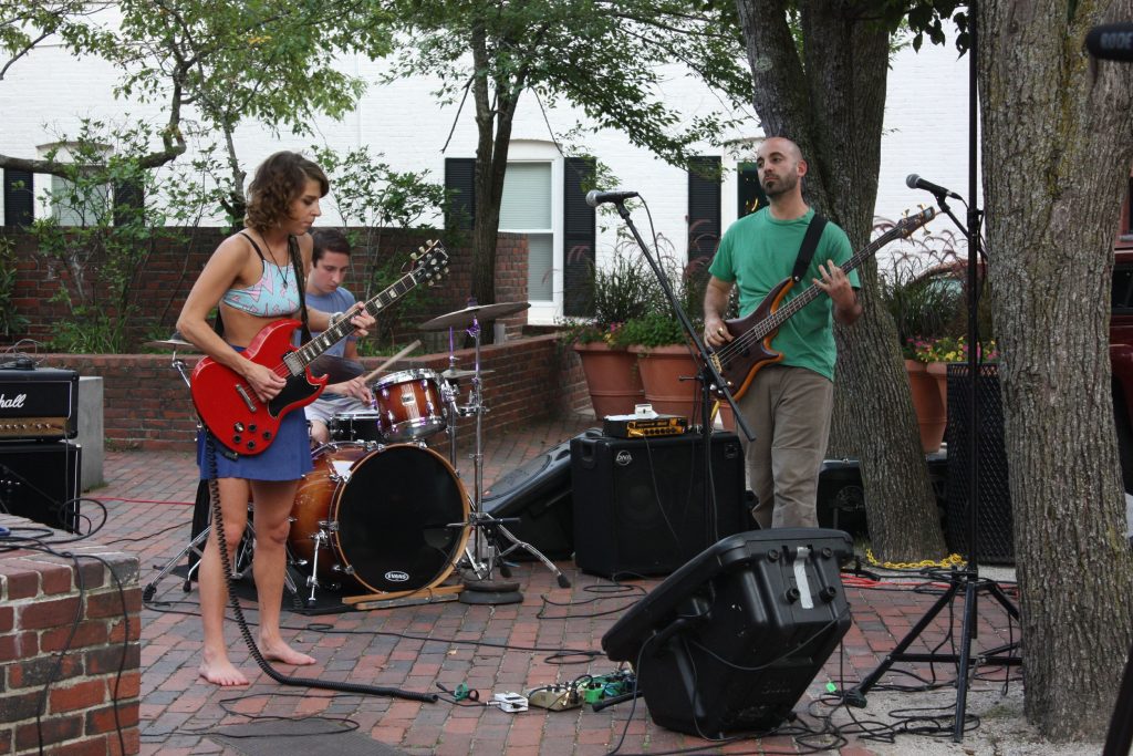 People Skills performs in Bicentennial Square in front of True Brew Barista on July 21. This was the first outdoor concert of the season for True Brew, which hosts live music every weekend.  JON BODELL / Insider staff