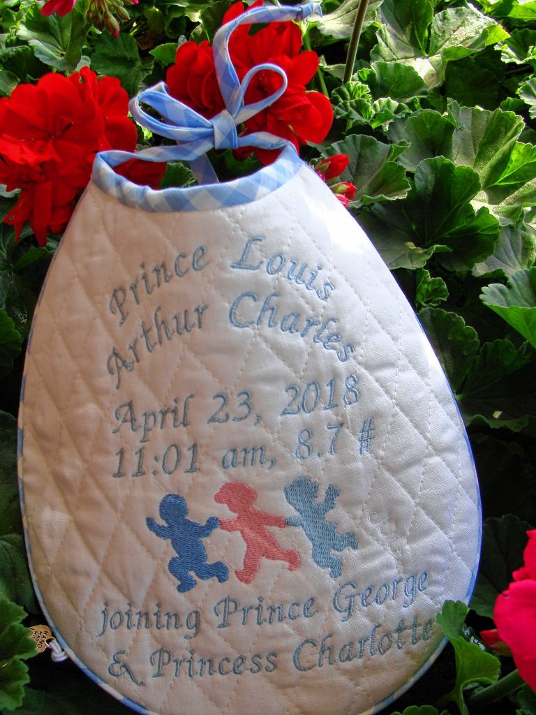 Janet Ulbrich made a keepsake bib for the new Royal baby, Prince Louis Arthur Charles, and sent it last week to Kensington Palace. Courtesy