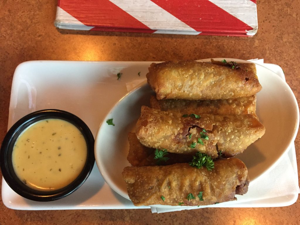 Crispy egg rolls filled with roast beef, peppers, onions and cheese. Served with a side of craft beer-cheese dipping sauce from TGI Fridays in Concord.