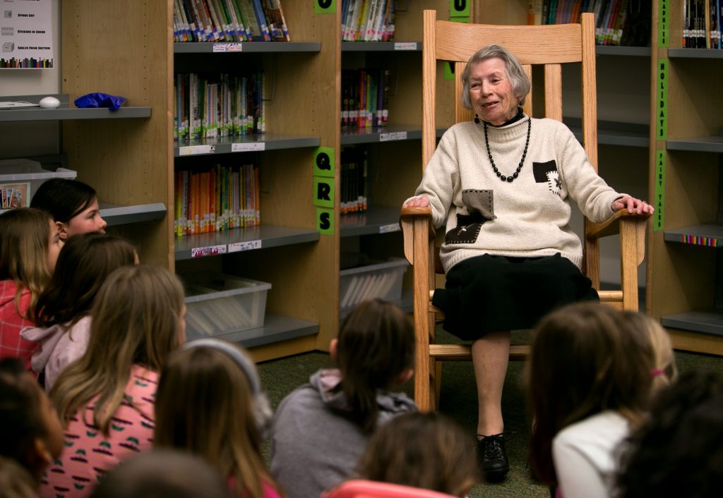 Clara Brogan, 92, spins a story to the second graders at Christa McAullife School in Concord Wednesday. Brogan comes in every other Thursday to do her storytelling at the school.  (GEOFF FORESTER / Monitor staff) GEOFF FORESTER