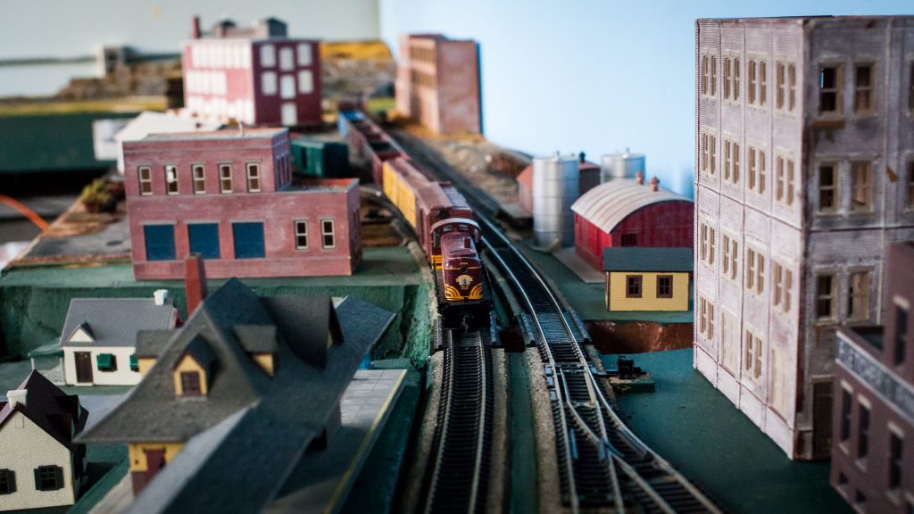 A model train sits on a set of tracks running through a representation of Franklin and the Boston and Maine Railroadâs Northern line at the Concord Model Railroad Club in Penacook on Thursday, Aug. 17, 2017. (ELIZABETH FRANTZ / Monitor staff) ELIZABETH FRANTZ