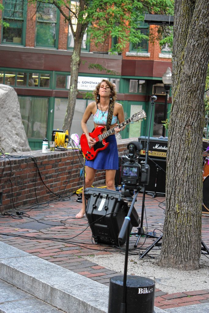 Chelsea Paolini of the band People Skills plays outside True Brew Barista in July 2017. JON BODELL / Insider staff