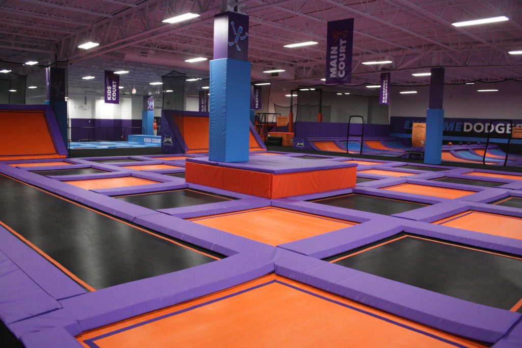 Altitude Trampoline Park at Steeplegate Mall has all the attractions you'd expect at a trampoline park -- mainly, trampolines. There are also foam pits, a rock wall, a dodgeball court, basketball hoops and more. JON BODELL / Insider staff