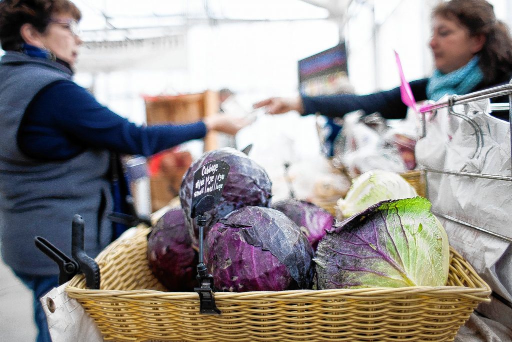 Fresh cabbage grown by Katie Surowiec at Surowiec Farm in Sanbornton is available at the Winter Farmers Market at Cole Gardens in Concord on Saturday, Nov. 22, 2014. The Surowiecs come to the market at Cole Gardens about every other week during the winter. (JULIE BYRD-JENKINS / Monitor staff) 