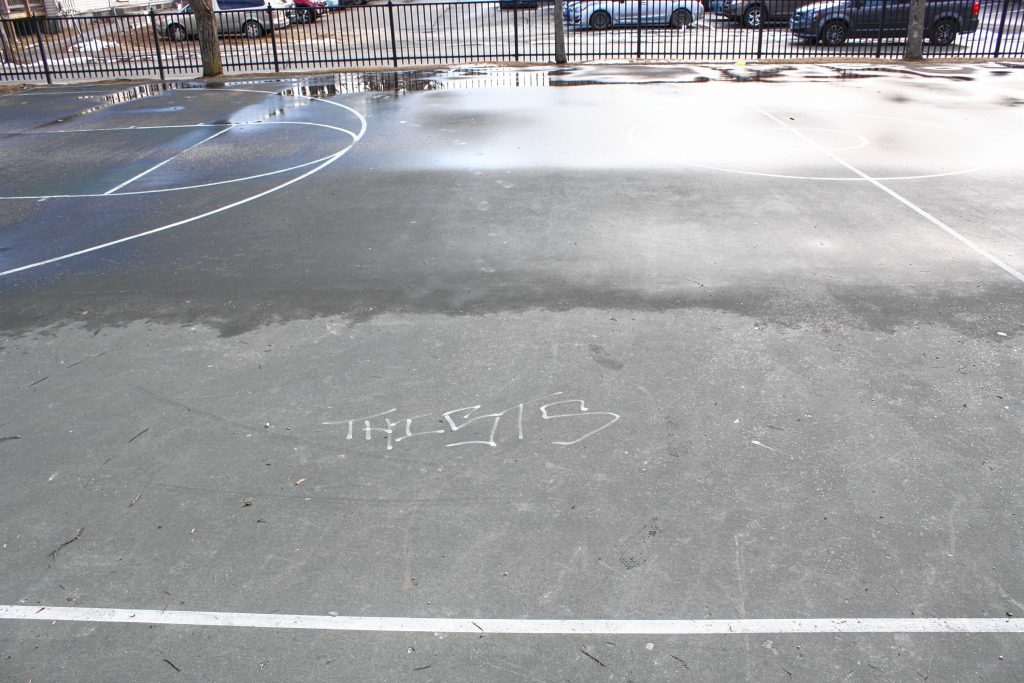 This small park is used mostly for basketball, and it gets quite a bit of use when the weather is nicer. Maybe you recognize this bit of graffiti on the court, or that black rail fencing you see in the background. JON BODELL / Insider staff