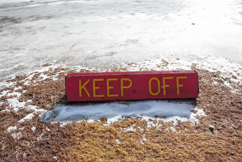 This park has plenty of signage telling you to keep off the ice -- though most of us hope that order gets lifted by Jan. 24 at the latest. JON BODELL / Insider staff