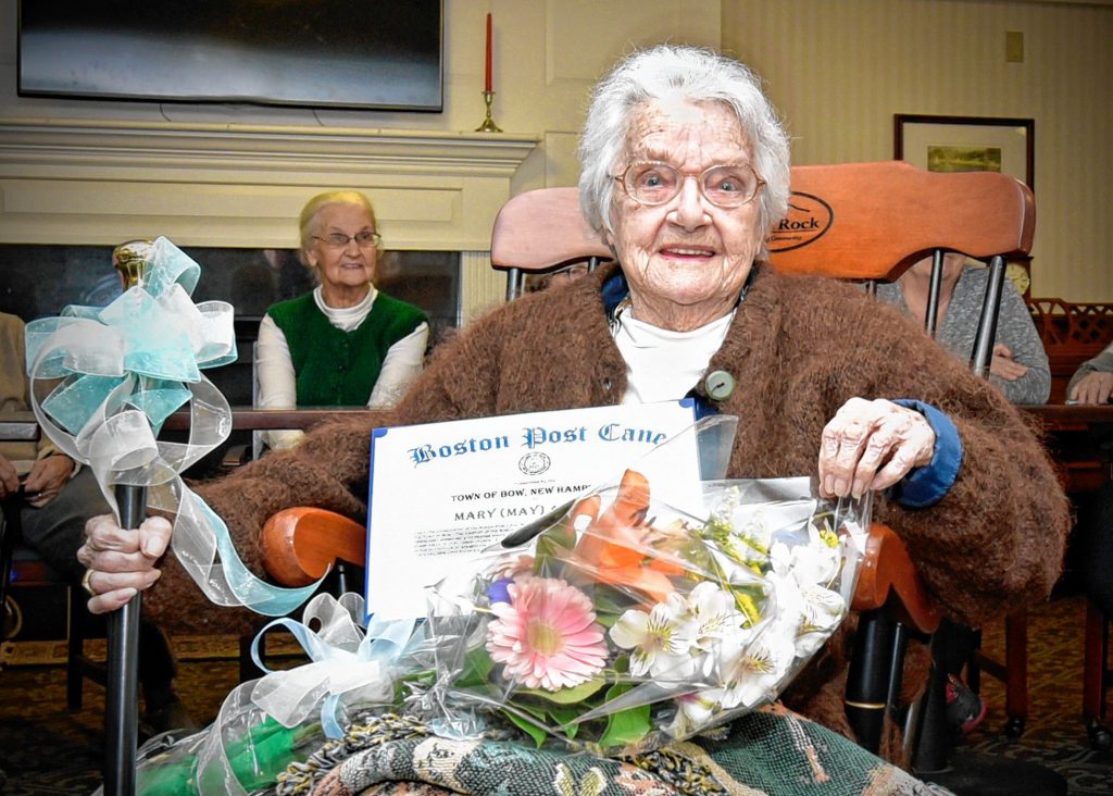 On Jan. 22, the Bow Board of Selectmen presented the Boston Post Cane to Mary (May) Allquist, the town of Bow’s oldest resident. Allquist recently celebrated her 97th birthday, and she has been a resident of Bow for 40 years. The town has presented the Boston Post Cane to the town’s most senior resident since 1909. At that time, the now-defunct Boston Post newspaper presented canes to communities in New Hampshire for this purpose. Bow residents are now awarded a replica cane, and the original cane is on display in the Board of Selectmen meeting room. Courtesy of Tonia Lindquist