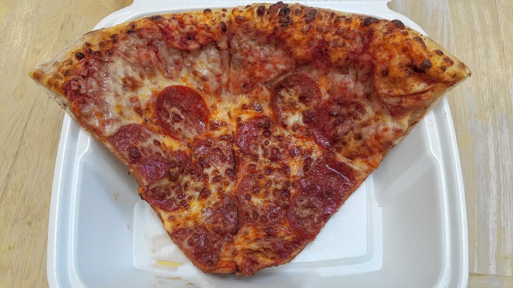 A double-wide slice of pepperoni from Checkmate Pizza. JON BODELL / Insider staff