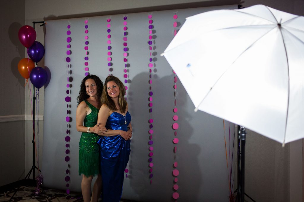 Miranda Belmont (left) and Shannon Krause, both of Bow, pose at the photo booth during Concord Mom Prom at the Grappone Center in Concord on Friday, May 12, 2017. (ELIZABETH FRANTZ / Monitor staff) Elizabeth Frantz