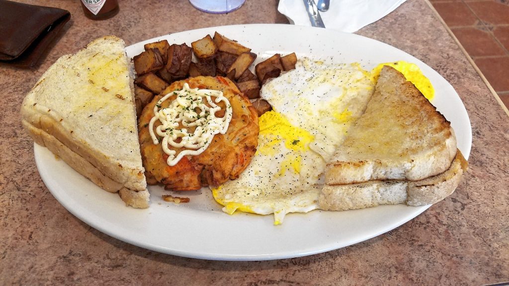 Carolina Crab Cake with eggs, home fries and homemade sourdough toast from The Post, the new breakfast and lunch restaurant on North Main Street. in downtown Concord. THE FOOD SNOB / Insider staff