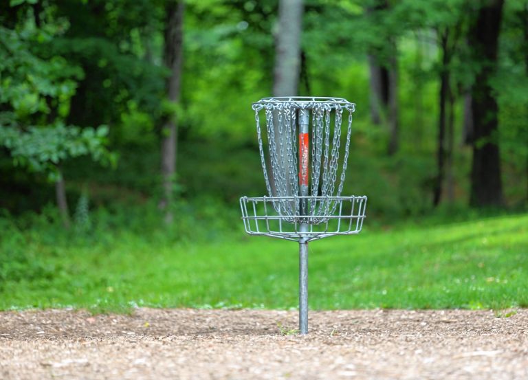 Making it into the chain basket is the goal for disc golfers. This one