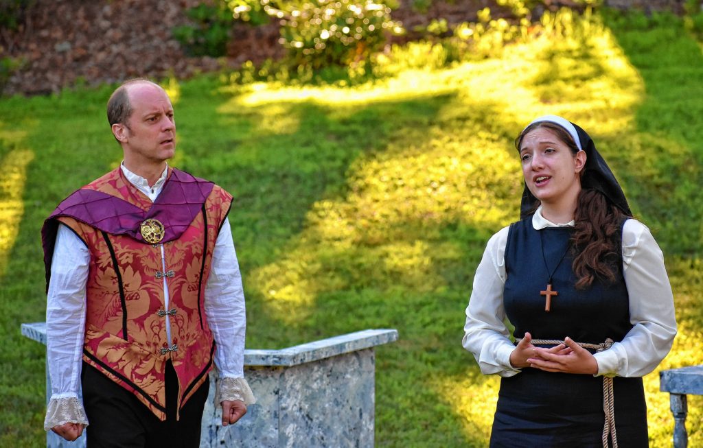 Jake Berger as Angelo and Ellie Bartz as Isabella act out a scene from Advice To The Players' 20th Anniversary Summer Mainstage Production of William Shakespeare's 'Measure for Measure,' to be performed at Eagle Square on Friday. Diana Evans