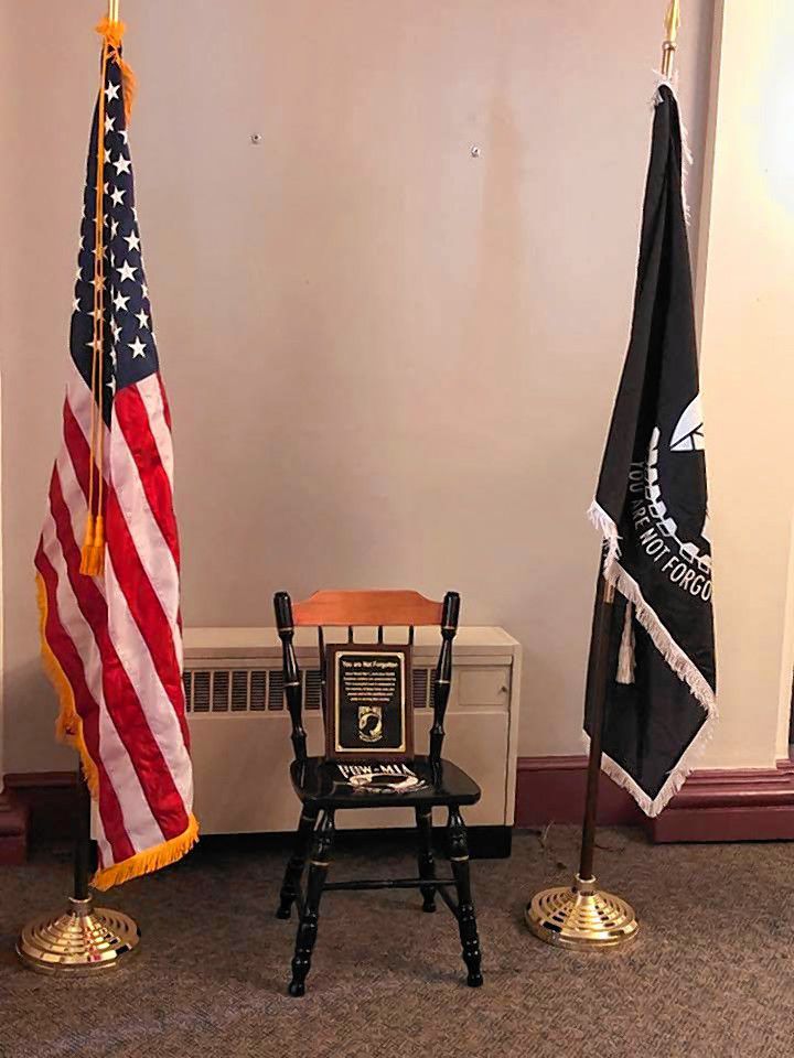 Members of Rolling Thunder Inc. New Hampshire Chapter 1, VFW Post 1631, and Mayor Jim Bouley were at City Hall last week to hold a brief ceremony dedicating the POW/MIA (prisoners of war, missing in action) Chair of Honor and flag that now sit in the lobby. Courtesy of City of Concord