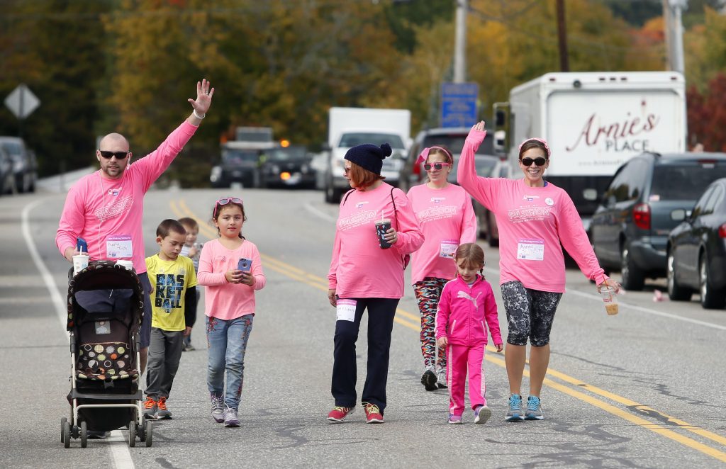 The Bosco-Fornier family heads up the end of the 2016 Making Strides against Breast Cancer Walk Sunday along South Fruit Street. GEOFF FORESTER