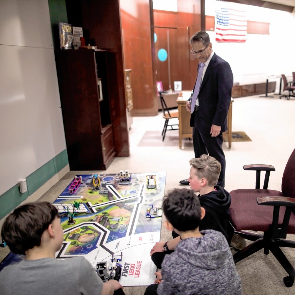 Commissioner of the Department of EducationFrank Edelblut talks with student at the Capital City Charter School in the Steepgate Mall on Thursday, November 7, 2019. GEOFF FORESTER