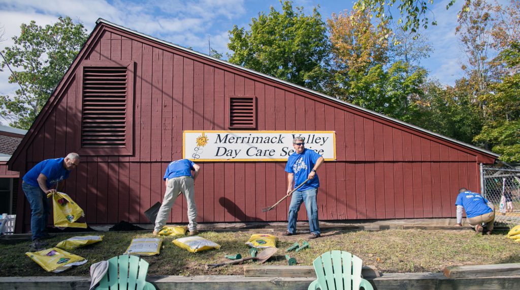 United Way Day of Caring participants Mark Lambert (left),  Bryan Westover, Casey Borden and Benjamin Beato work on a putting potting soil for a garden for next spring at the Merrimack Valley Day Care Service on Wednesday, September 18, 2019. Each year, the Granite United Way spreads volunteers around the community to help with projects and sponsors. This year leaders and empolyees of local businesses went to Havenwood Heritage Heights, Merrimack County Day Care, Canterbury Shaker Village and Live and Let Live Farm in Chichester. GEOFF FORESTER