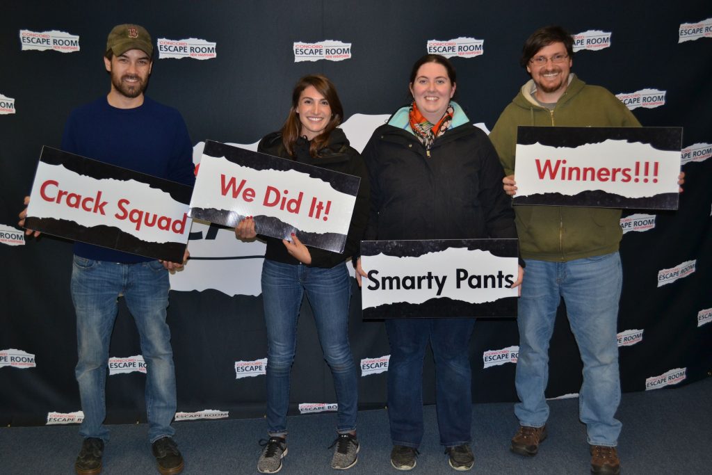 Since we were only about three seconds past the allotted 75 minutes to finish The Sanctuary at Escape Room Concord, we decided to hold up the signs proudly displaying that we were victorious. TIM GOODWIN / Insider staff