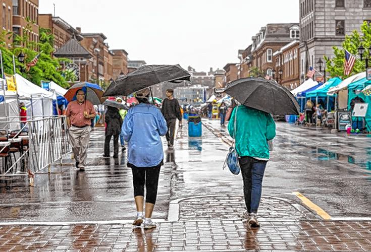 Rain didn’t stop people from browsing Main Street on Thursday during the first day of Market Days in Concord.  