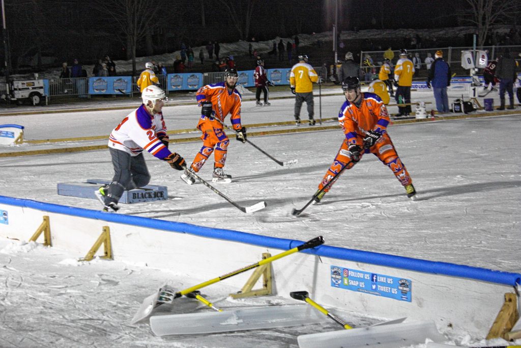 Hundreds of spectators braved the cold Saturday night to check out the action at the 1883 Black Ice Pond Hockey Championship at White Park on Jan. 25, 2019.  