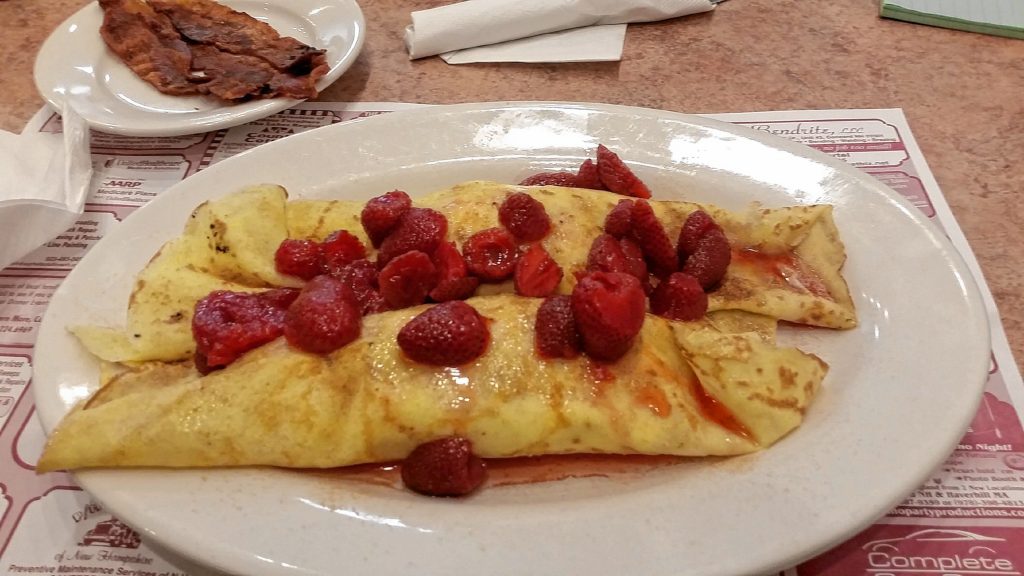 Crepes filled with maple cream and topped with strawberries from the Post Downtown.  