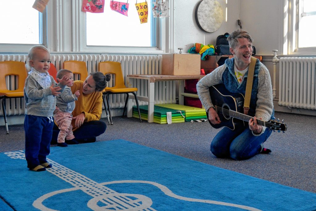 Mr. Aaron sings and dances with his little friends earlier in March.  Sarah Pearson