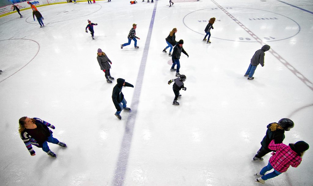 Skaters make their way around the rink at Everett Arena inside Saturday.  (GEOFF FORESTER / Monitor staff) 