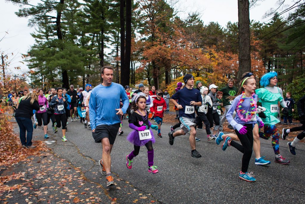 Runners leave the starting line of the Wicked FIT 5K race at Rollins Park in Concord on Saturday, Oct. 29, 2016. (ELIZABETH FRANTZ / Monitor staff) Elizabeth Frantz