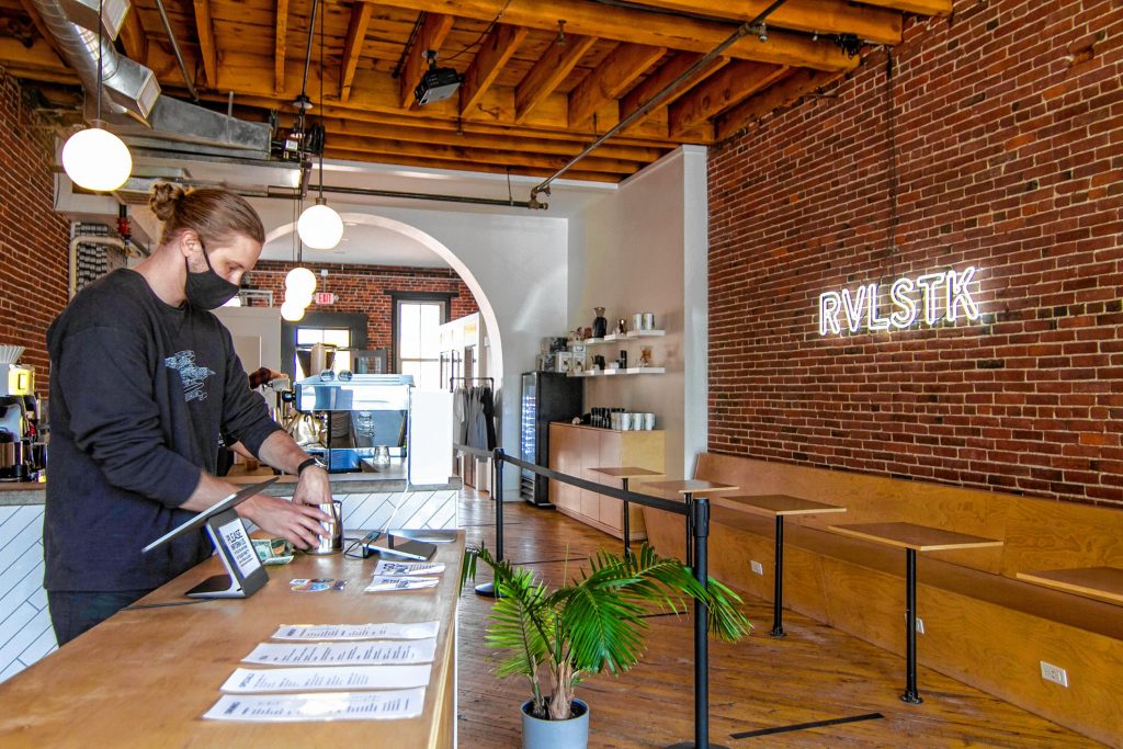 Co-Owner Alex Stoyle cleaning up for the day at Revelstoke Coffee located in Downtown Concord on Main Street October 1st, 2020. ALLIE ST PETER