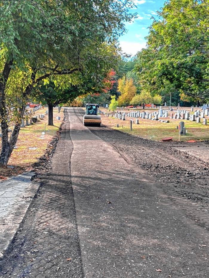 Continental Paving is paving more than 1,200 feet of roads in Blossom Hill and Concord Calvary Cemetery this week. The paying project will be finished early next week. 