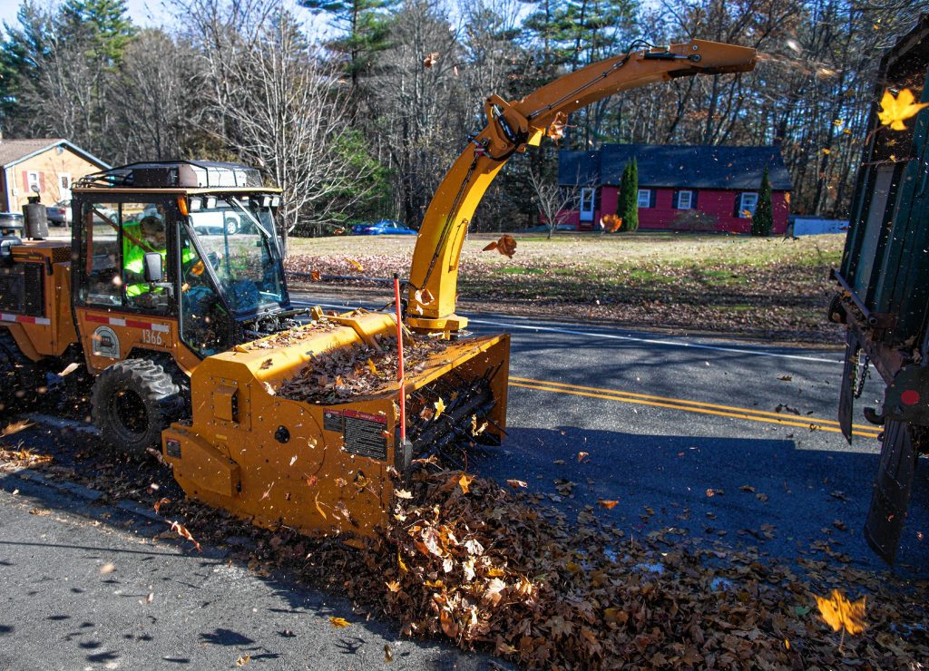 The new leaf collection system moves up Sewell Falls Road in Concord on Thursday, November 5, 2020. GEOFF FORESTER