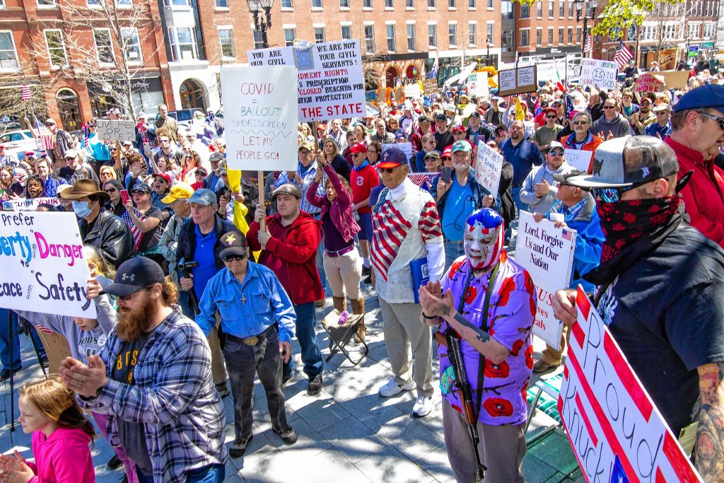 Part of the crowd at the #ReOpenNH Rally at City Plaza in front of the State House on Saturday, May 2, 2020. The crowd was much larger than the first rally last month. 