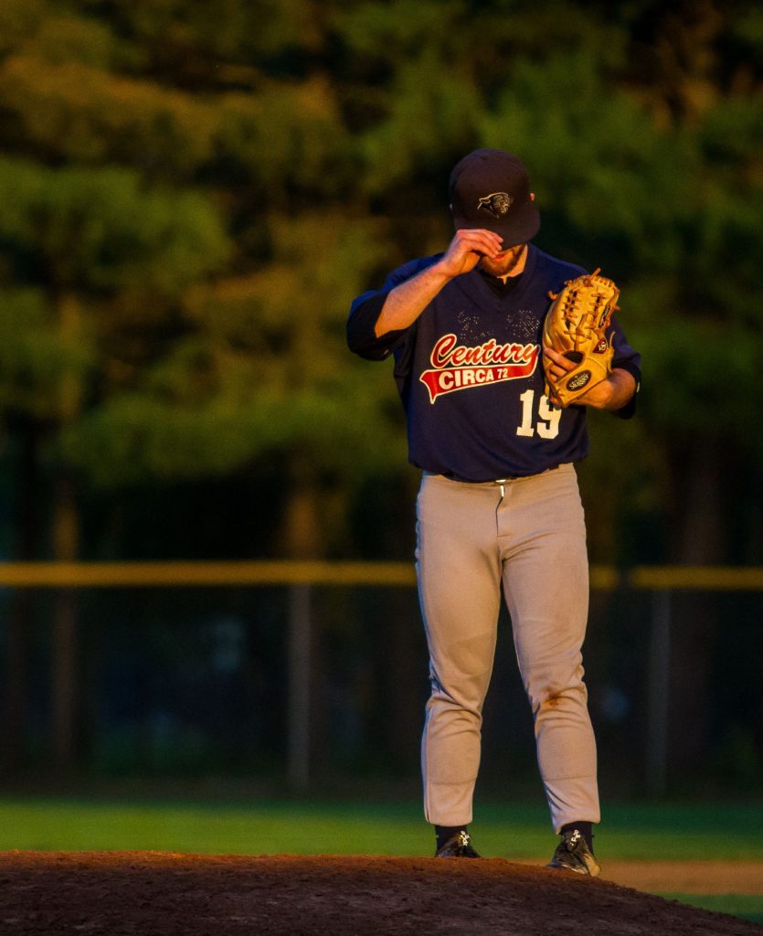 Century 21 pitcher Tom Hyland (19) takes the mound during the Concord Sunset League championship series game at Memorial Field in Concord on Wednesday, August 9, 2017.  Century 21 defeated Grappone, 9-0, in six innings. (ELIZABETH FRANTZ / Monitor staff) ELIZABETH FRANTZ