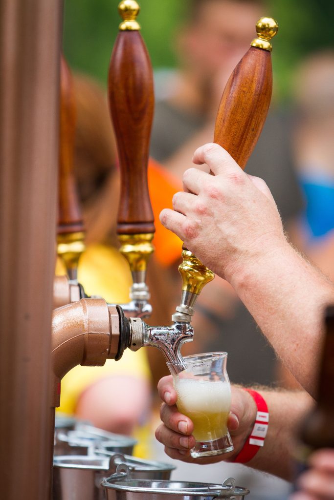 A sample of craft beer is served during the New Hampshire Brewers Festival at Kiwanis Riverfront Park in Concord on Saturday, July 22, 2017. (ELIZABETH FRANTZ / Monitor staff) ELIZABETH FRANTZ