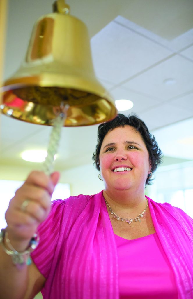 Lisa Ober rings the bell at the Payson Center for Cancer Care. Every time a cancer survivor finishes treatment at the Payson Center, they ring a bell.  At the start of Rock 'N Race, the bell will be rung in honor of all friends and family who have experienced cancer.  Courtesy