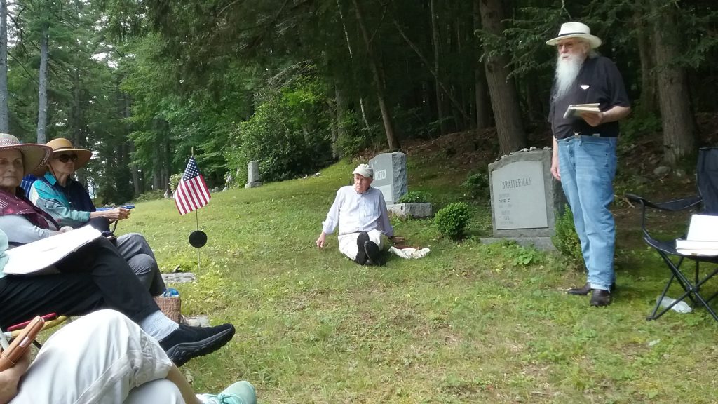 Don Melander leads a LINEC discussion of poet and friend Joel Oppenheimer, a late colleague at New England College who is now buried in Henniker. Seated in the background is John McCausland, a participant in the class. 