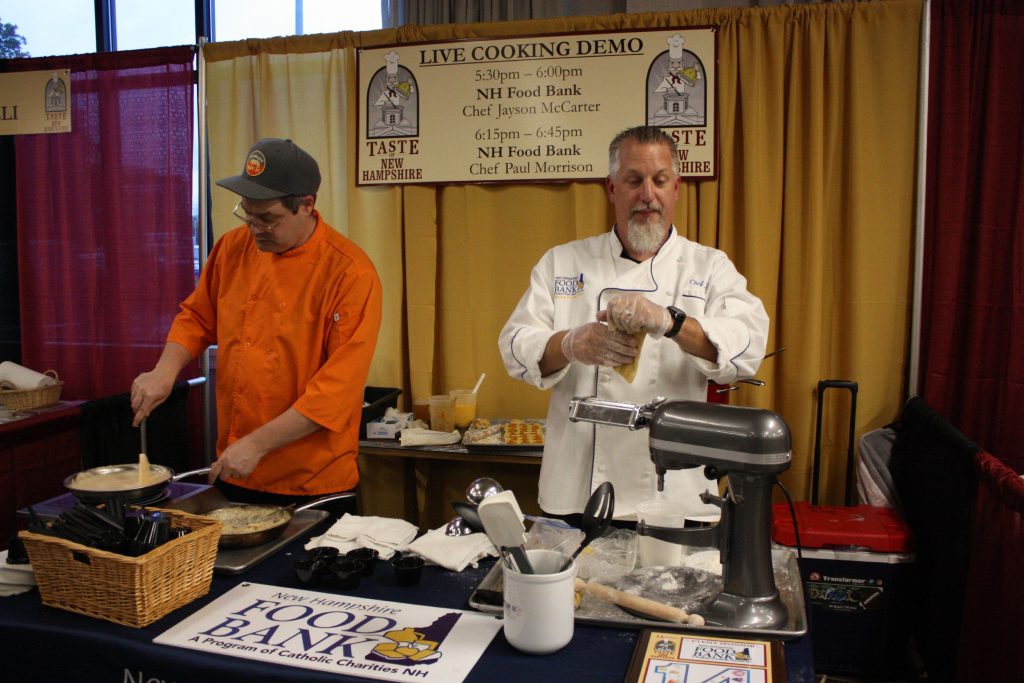 Jayson McCarter (right) and Paul Morrison with the New Hampshire Food Bank prepare some risotto as part of their live cooking demo at the 14th annual Taste of New Hampshire at the Grappone Conference Center in Concord on Thursday, Oct. 17, 2019. JON BODELL / Insider staff